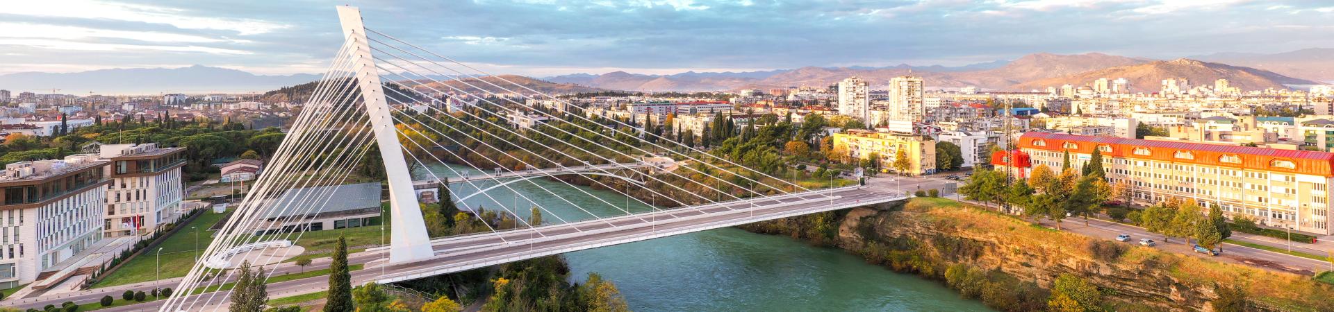 Aerial view of the Podgorica, Montenegro, featuring Millennium bridge and Moraca river. Photo: Predrag Jankovic/AdobeStock