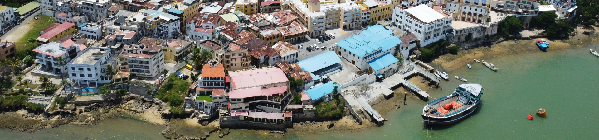 Dar es Salaam Tanzania aerial view with dense architecture and harbor. Photo: Salah Latreche/AdobeStock